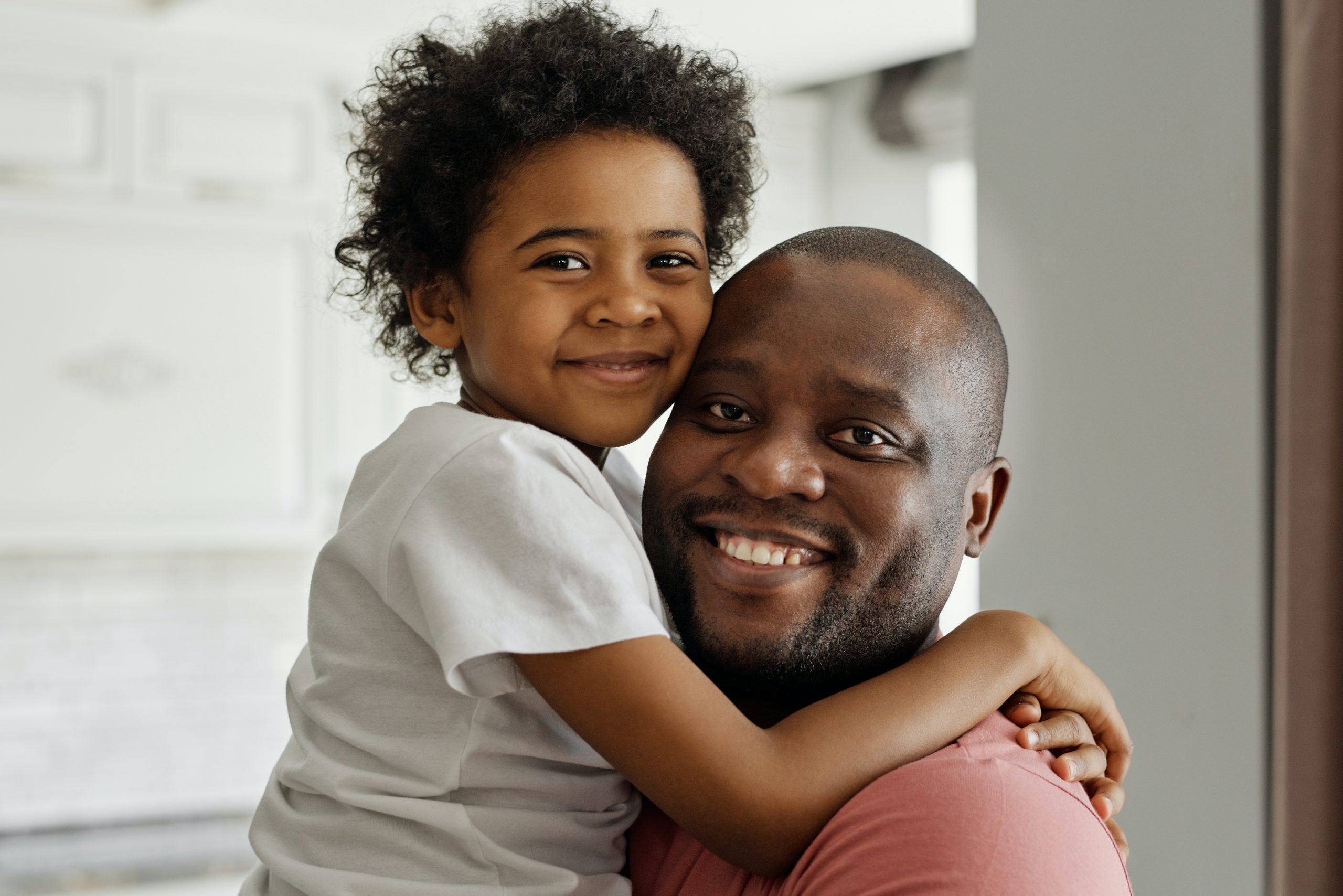 Smiling girl and her father
