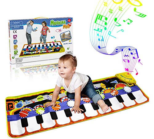 Dance mat in a form of piano keys with a baby on it. Gifts for children. 