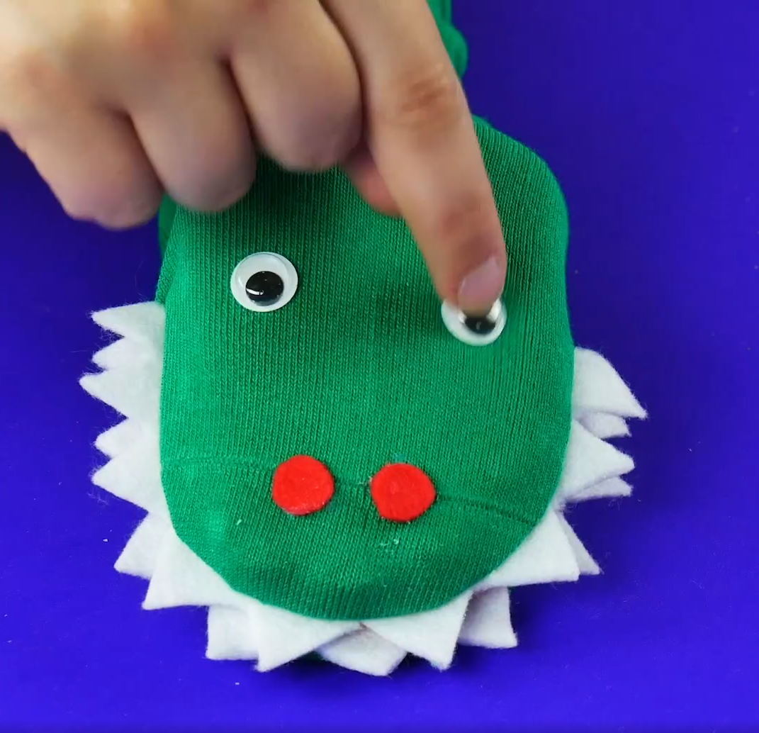 how to make a dinosaur puppet 13