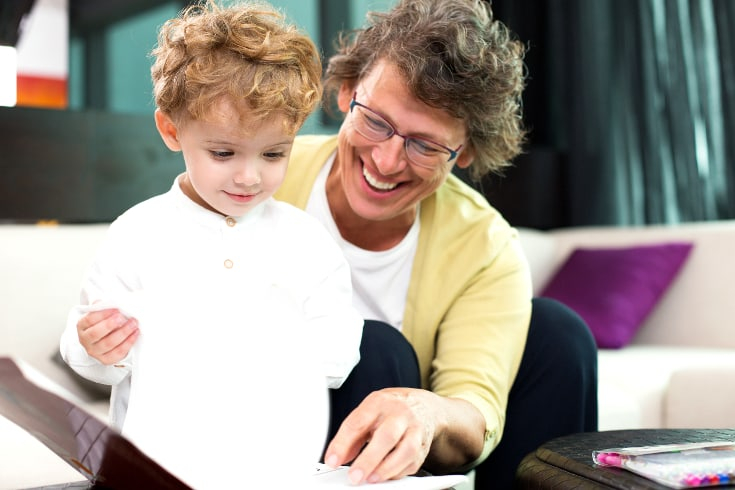 Dad and son reading together