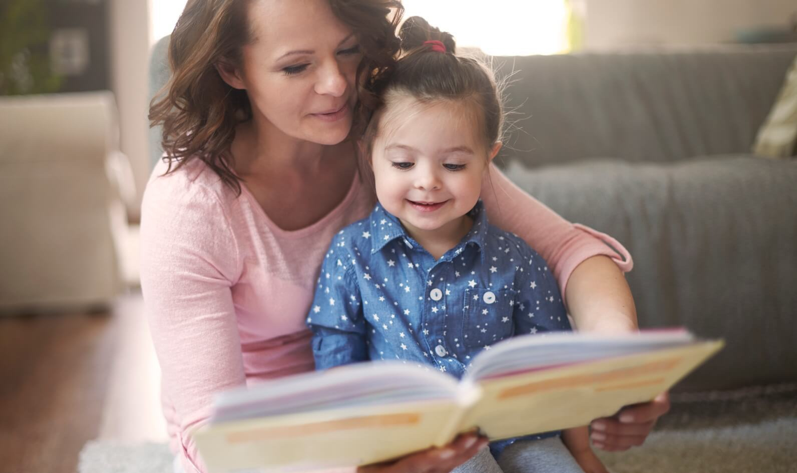 Mom and Daughter are reading together