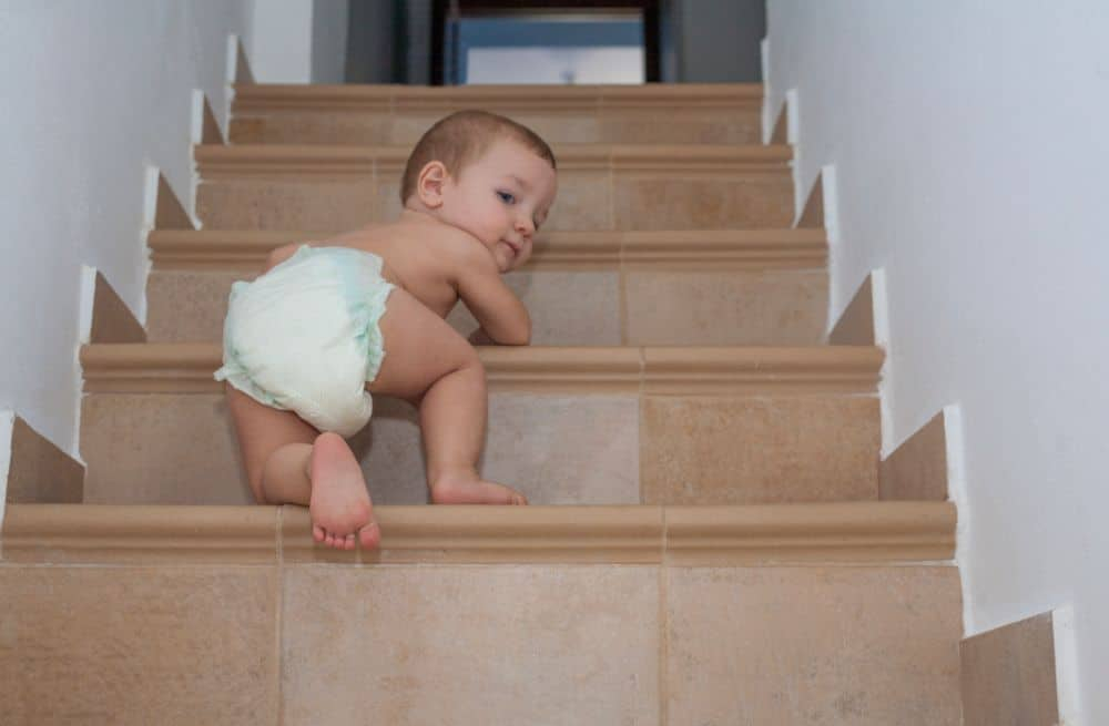 Toddler coming up the stairs
